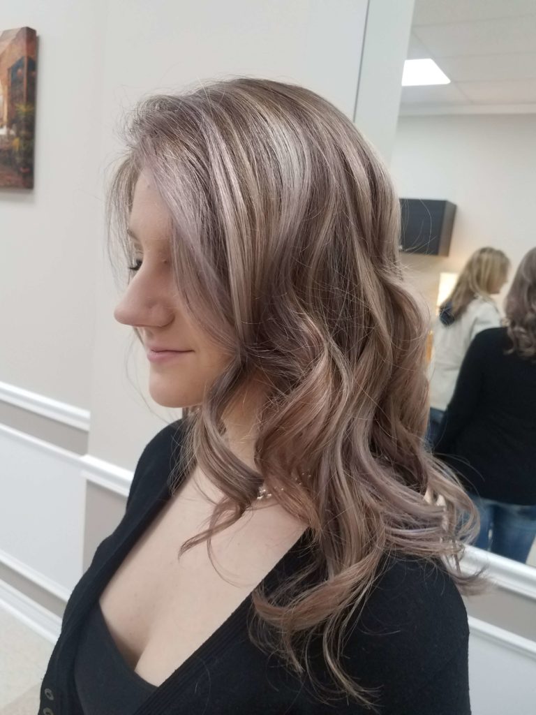 Long waves in a soft ash tone, styled out.