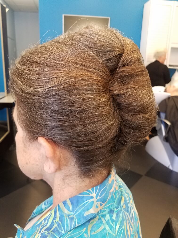 A French twist, rolled and pinned.