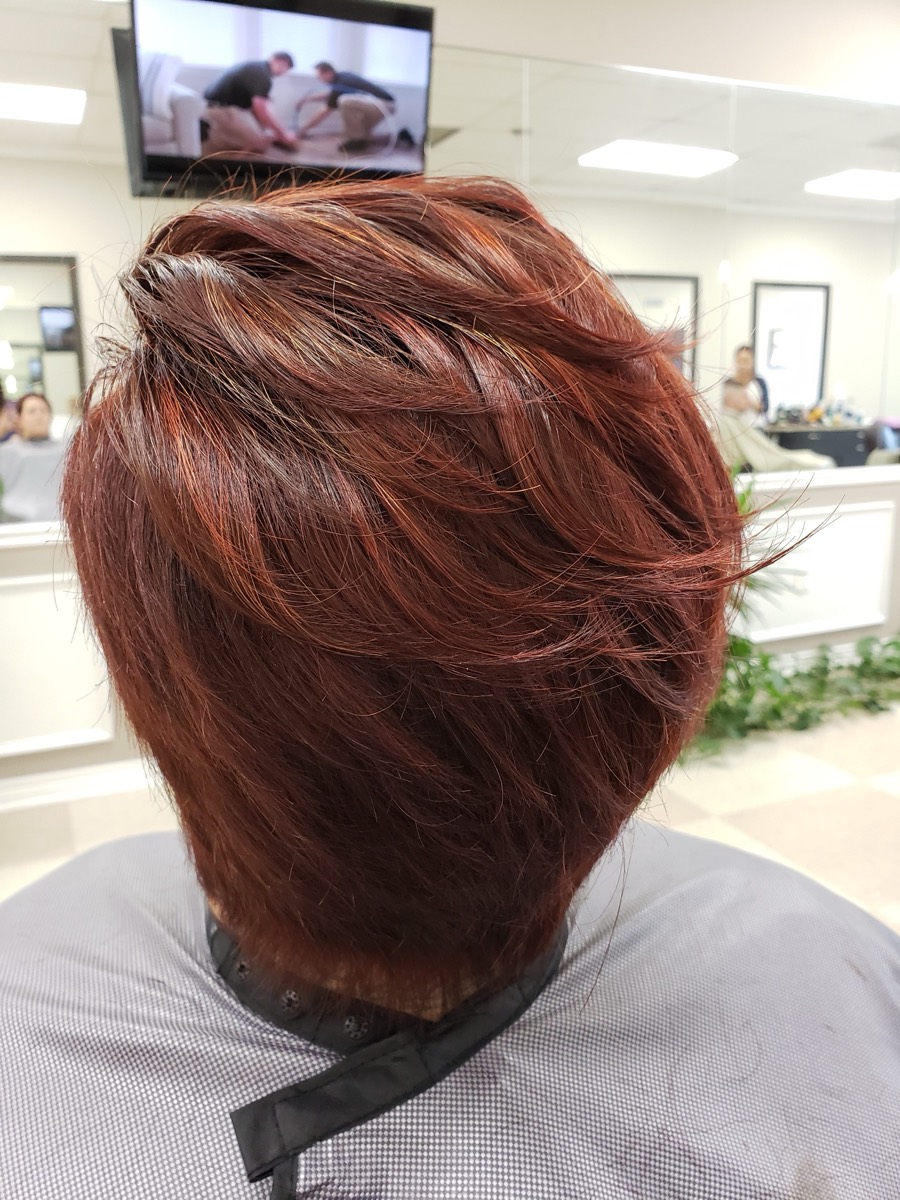 A copper red layered bob.